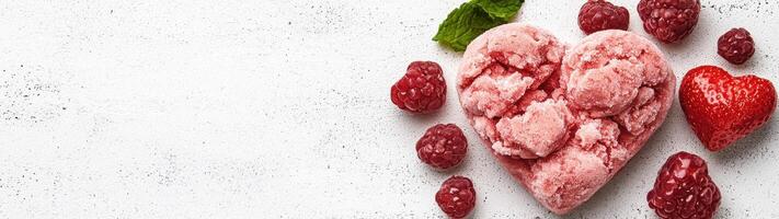 Heart shaped raspberry sorbet with fresh raspberries and strawberry photo