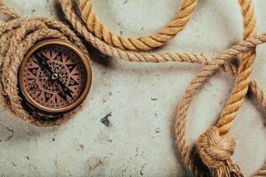 Compass on a gray gradient background photo