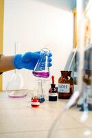 Laboratory experiment involving colorful chemical reactions in a research setting during a daytime session photo