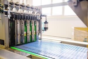 Automation in packaging process displayed with bottles moving through a conveyor at a modern industrial facility photo