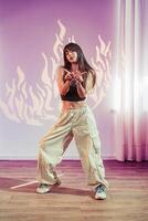 Dynamic dance performance with expressive movements in an artistic studio setting photo
