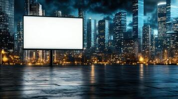 Futuristic cityscape with blank digital billboard at night photo