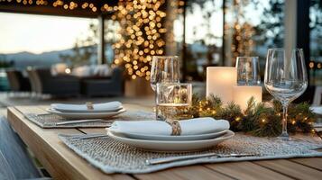 Cozy dinner setting with elegant tableware and warm lights photo