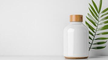 Modern cosmetic bottle mock up with wooden cap and green leaf accent photo