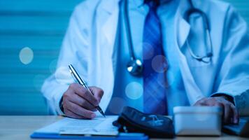 Focused Medical Practice, Doctor in white coat diligently writes notes with pen while surrounded by medical instruments, highlighting importance of accuracy in patient care and documentation photo