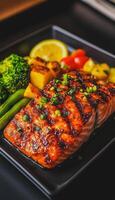 Grilled Salmon with Fresh Veggies, Delightful grilled salmon served with vibrant vegetables, garnished with lemon and herbs for healthy, tasty meal photo