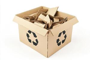 Recyclable cardboard box filled with used packing materials ready for disposal at a recycling center photo