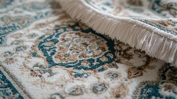 Elegant traditional rug with detailed patterns and fringes, showcasing intricate design and texture in a cozy interior setting photo