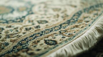 Elegant traditional rug displaying intricate patterns in soft colors lying on a polished wooden floor photo