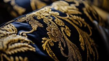 Luxurious embroidered fabric displaying intricate floral and vine patterns in a close-up view photo