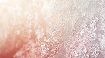 Delicate lace fabric adorned with intricate floral patterns illuminated by soft light photo