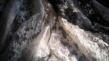 Elegant lace fabrics in soft light showcasing intricate floral patterns and textures photo