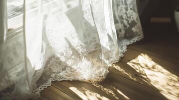Delicate lace curtain filtering soft sunlight into a cozy interior space during a peaceful afternoon photo
