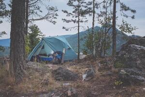 A tent in the woods photo