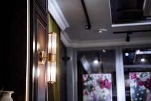 A close up of a wall mounted lamp photo