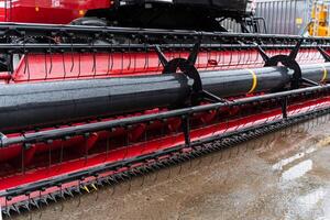 A large red machine with a large black frame photo