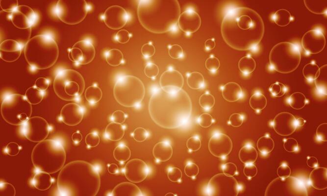Abstract light bokeh orange background. Shiny bright circle bubbles. soft gold light.