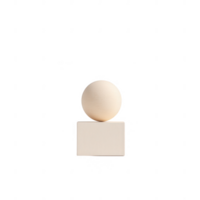 Minimalist geometric shapes featuring a sphere atop a cube, perfect for design projects. png