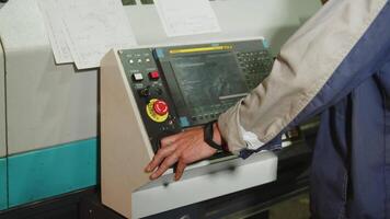 The Industrial Machinery Control Panel is currently in use for monitoring operations and settings. Media video