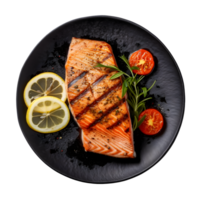 grilled salmon steak on black plate with lemon and rosemary png