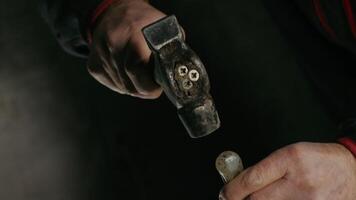 A closeup image of a hand holding an industrial tool, highlighting craftsmanship and precision video