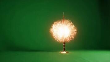 Golden firework exploding on green screen video
