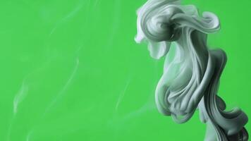 ångande former flätas ihop skapande dynamisk former. grön skärm Chromakey video