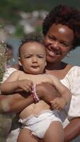 A Mother and Her Baby are Delightfully Enjoying a Beautiful Sunny Day Outdoors Together video
