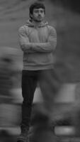 Contemplative Figure Within a Vibrant Urban Environment Capturing Depth and Emotion video