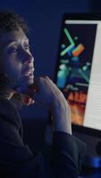 A Thoughtful Professional Analyzing Complex Data on a Computer Screen in the Office video