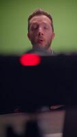 A Professional Speaker Excelling in Utilizing a Green Screen Studio for Engaging Presentations video