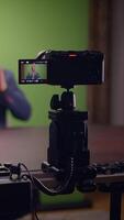 Setting Up a Filming Environment with a Camera Placed Firmly on a Tripod in a Studio Space video