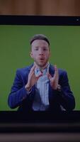 A presenter uses a green background on a call to engage the audience and showcase skills video