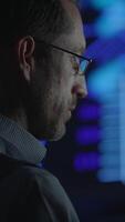 A Focused and Dedicated Professional Analyzing Data in a Modern and Innovative Environment video