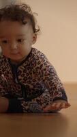 A Curious Baby Joyfully Exploring at Home while Dressed in a Trendy and Stylish Outfit video