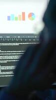 Analyzing data on a screen, featuring graphs and charts for better insights and understanding video