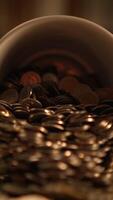 A Detailed CloseUp View of Various Coins within a Container or Jar for Photography Use video