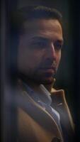 A contemplative man is illuminated by the gentle evening light, creating a beautiful scene video