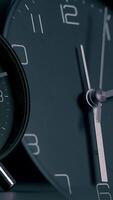 This is a closeup image of a modern clock clearly displaying the time in a stylish manner video