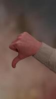 An Artistic and Symbolic Gesture Representing Clear Disapproval in Social Contexts video