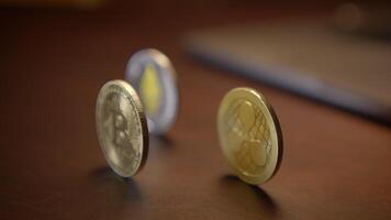 A CloseUp of Unique and Distinctive Coins Displayed on a Beautiful Wooden Surface video