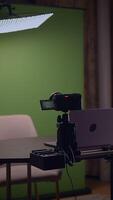 A Professional Studio Setup that Includes a Green Screen Ideal for Streaming or Recording video