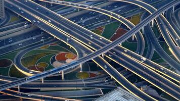 A stunning aerial view of an intricate urban highway overpass showcasing city dynamics and patterns video