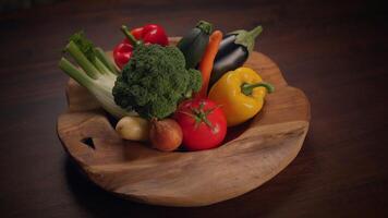 A Vibrantly Colorful Array of Fresh Vegetables Presented Beautifully in a Wooden Bowl video