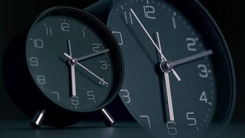 A display of stylish black analog clocks showcases their elegance and design beautifully video