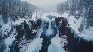 A majestic winter waterfall cascading amidst snow-covered forest landscape photo