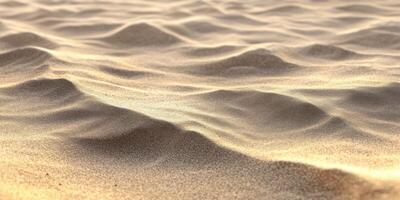 Golden sand dunes with smooth textures in desert environment captured in soft light photo