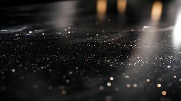 Sparkling dust particles on a dark surface with light reflections photo