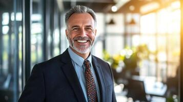 Confident smiling businessman in office hallway with sunlight background photo