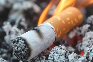 Burning Cigarette on Ashes Concept of Smoking and Addiction photo
